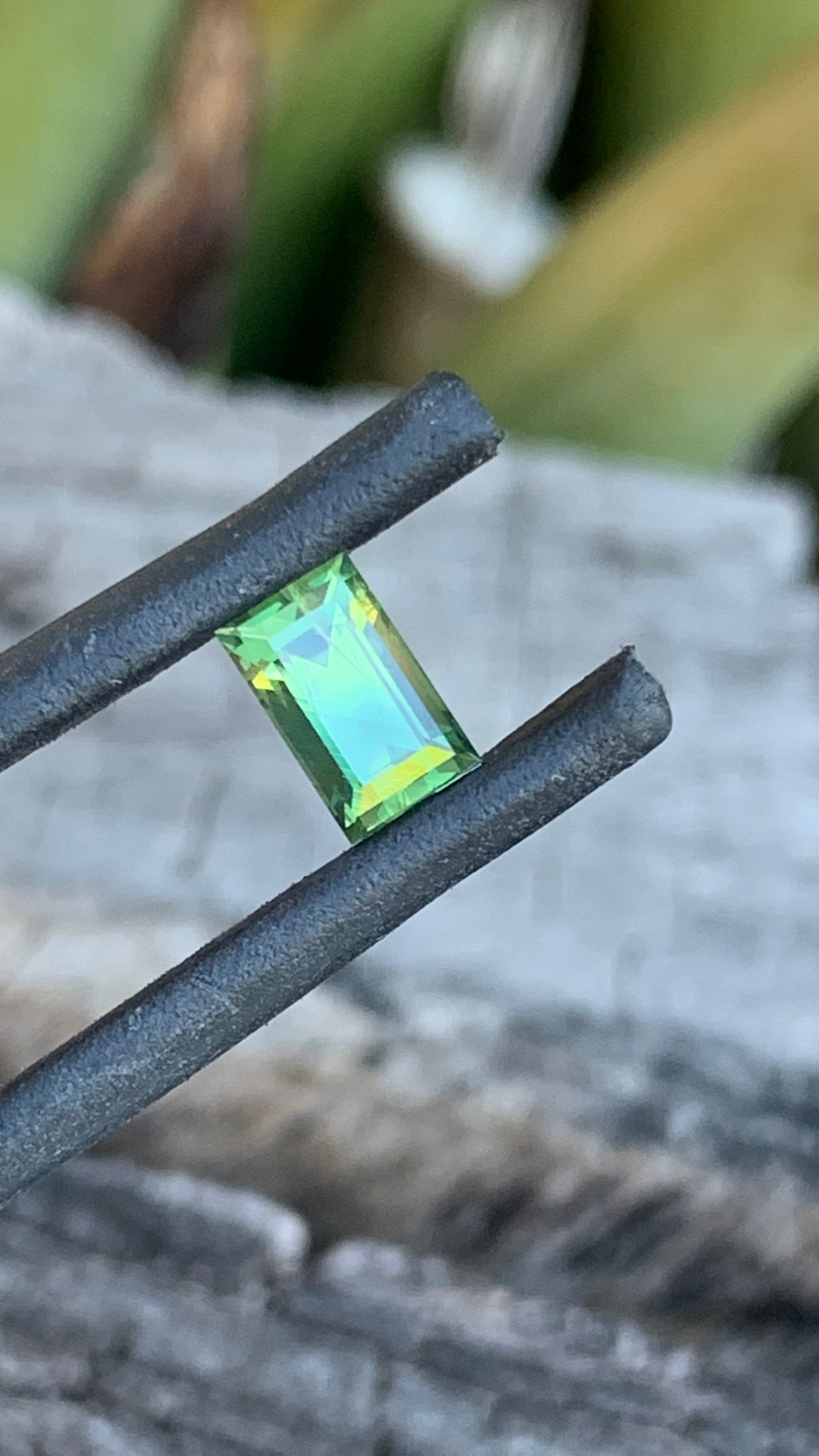 Light green baguette cut Australian sapphire with yellow zoning