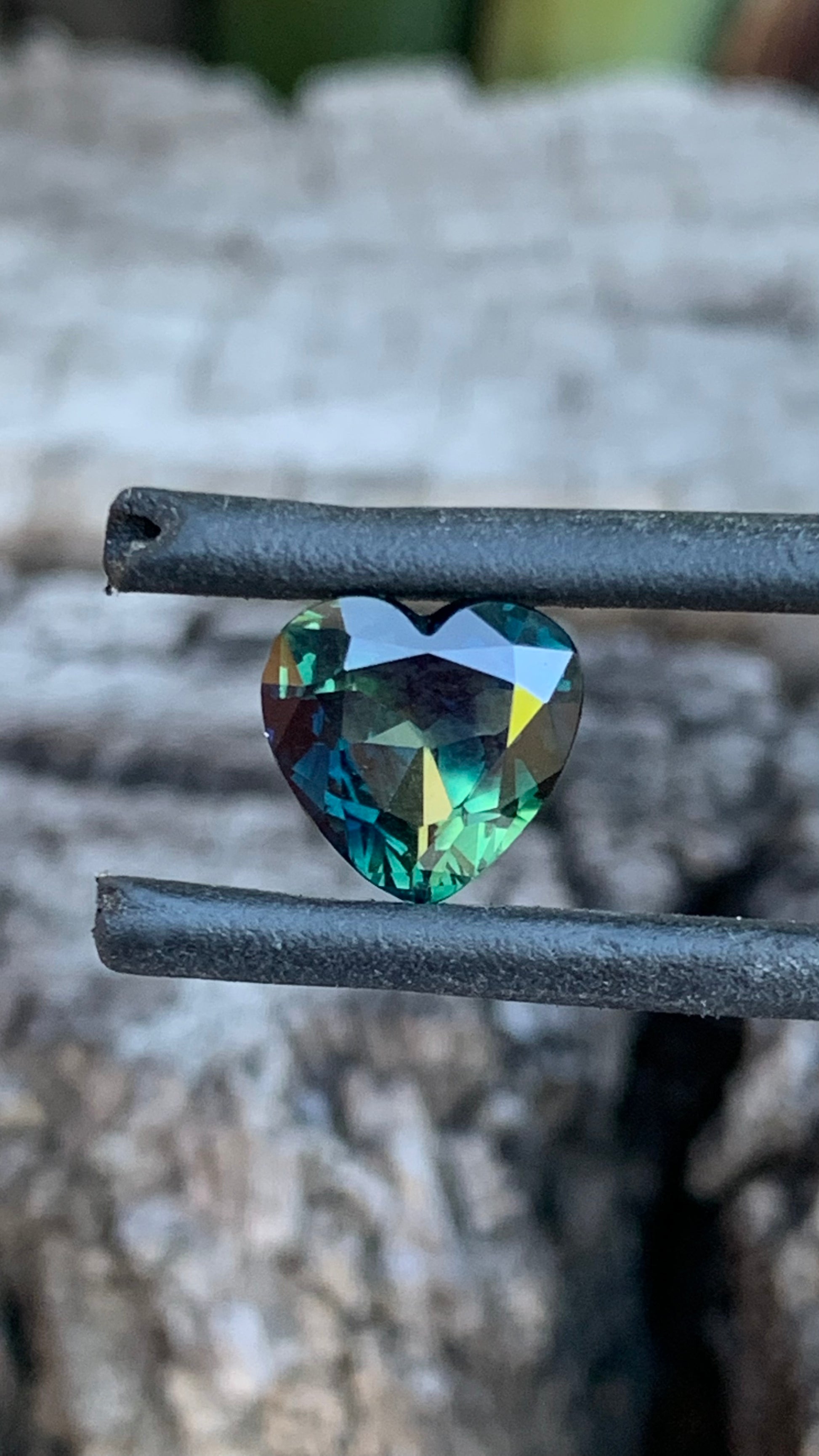 1.79ct heart shaped Australian parti sapphire with deep colour and colour play