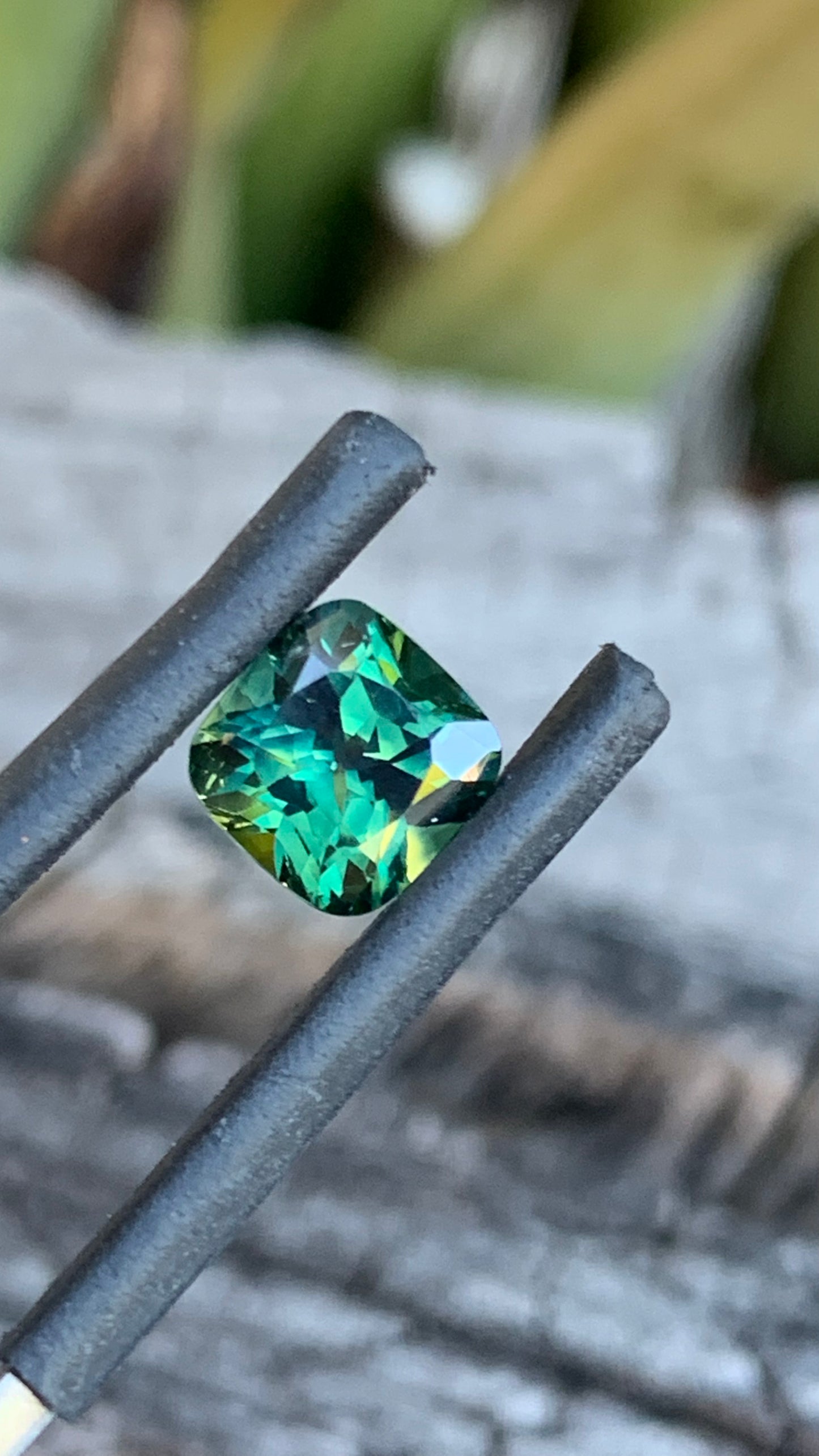 Close up of Green parti square cushion Australian sapphire, 1.74ct