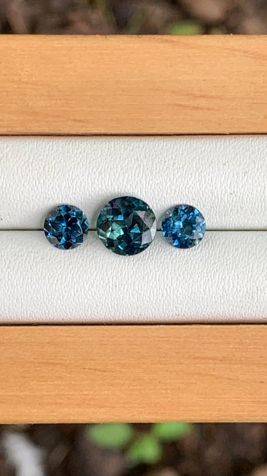 blue parti centre Australian sapphire trilogy set with blue accents 2.00ct