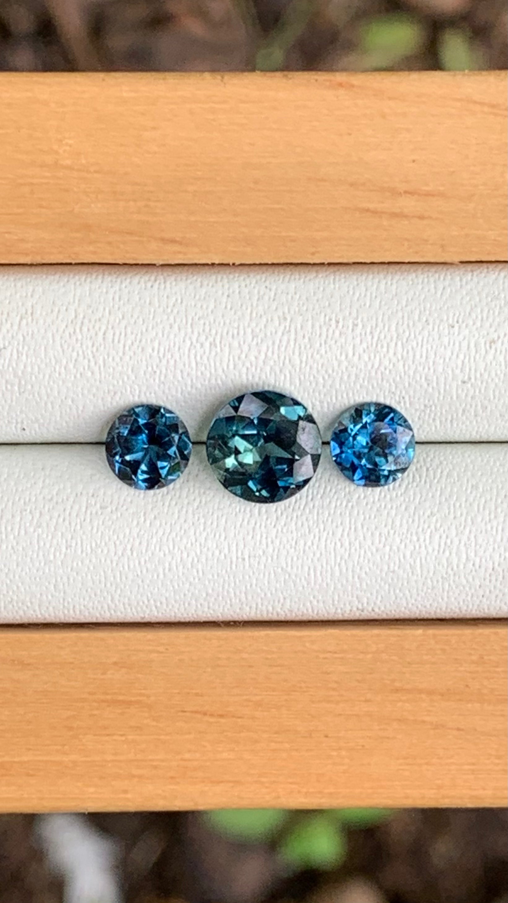hand selected Australian sapphire trilogy blue parti centre natural light