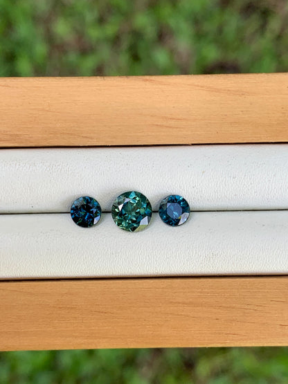 Australian sapphire trilogy teal centre and blue accents loose set