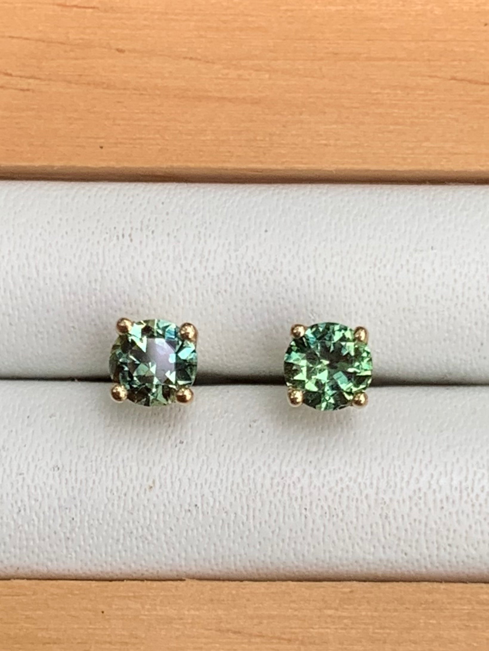 Close up of Teal Australian Sapphire Stud Earrings