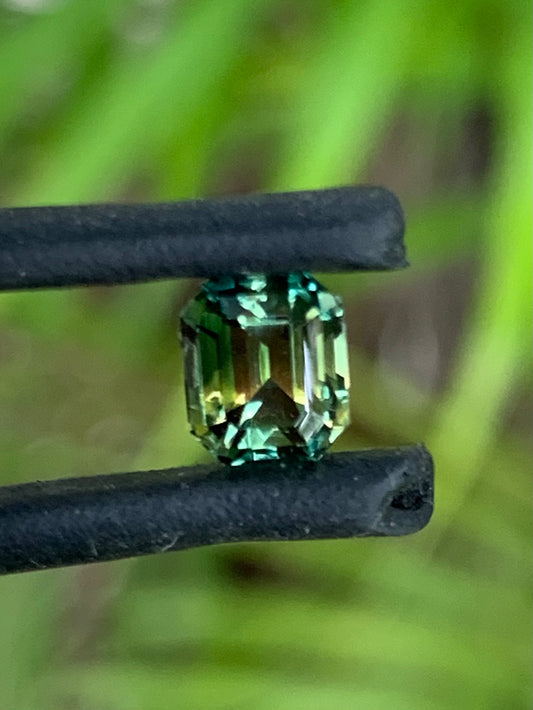 emerald cut Australian parti sapphire yellow and green vibrant natural gemstone