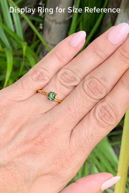 On hand close up 1.08ct yellow and green parti sapphire unheated Queensland gemstone