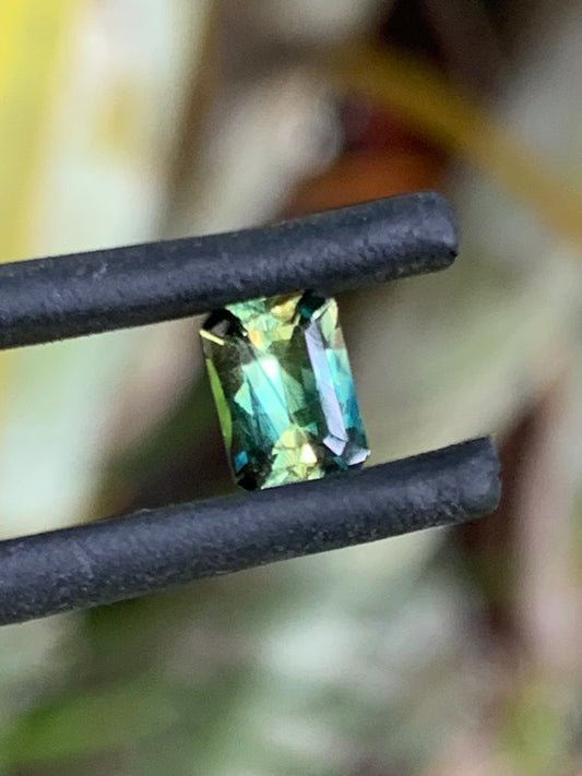 0.69ct unheated Australian yellow parti sapphire emerald cut with zoning