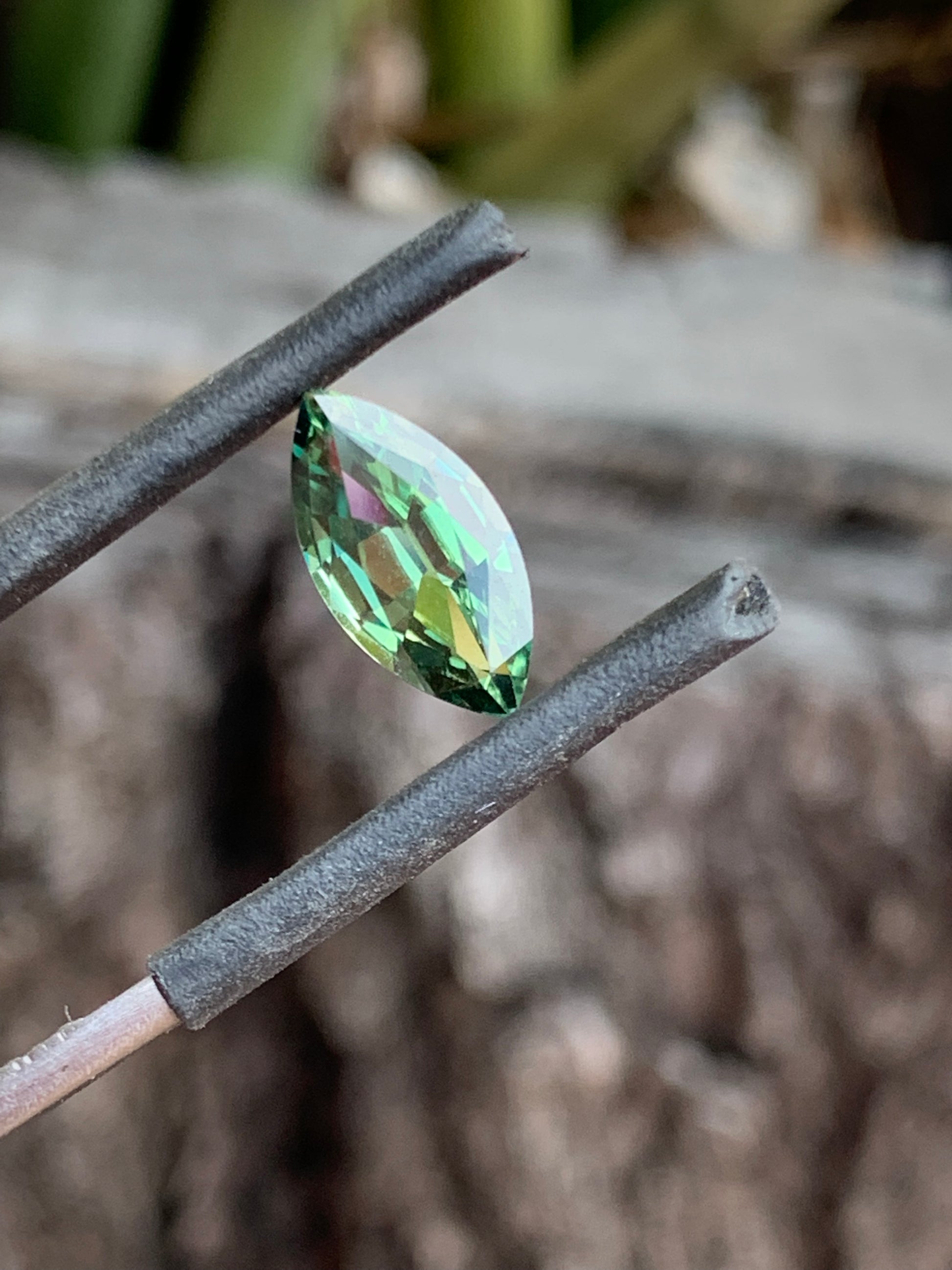 close up 2.38ct green sapphire loupe clean unheated Queensland gemstone