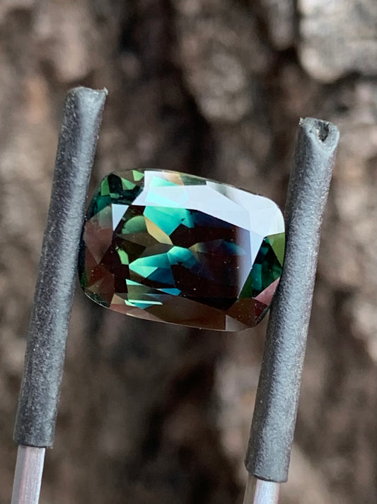 7.64ct unheated Australian parti sapphire cushion cut with yellow zoning