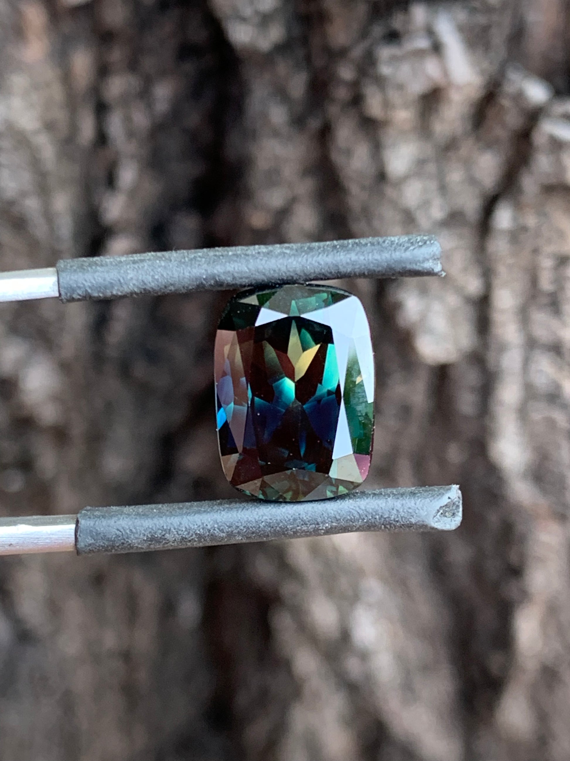 close up 7.64ct parti sapphire unheated Queensland gemstone cushion cut