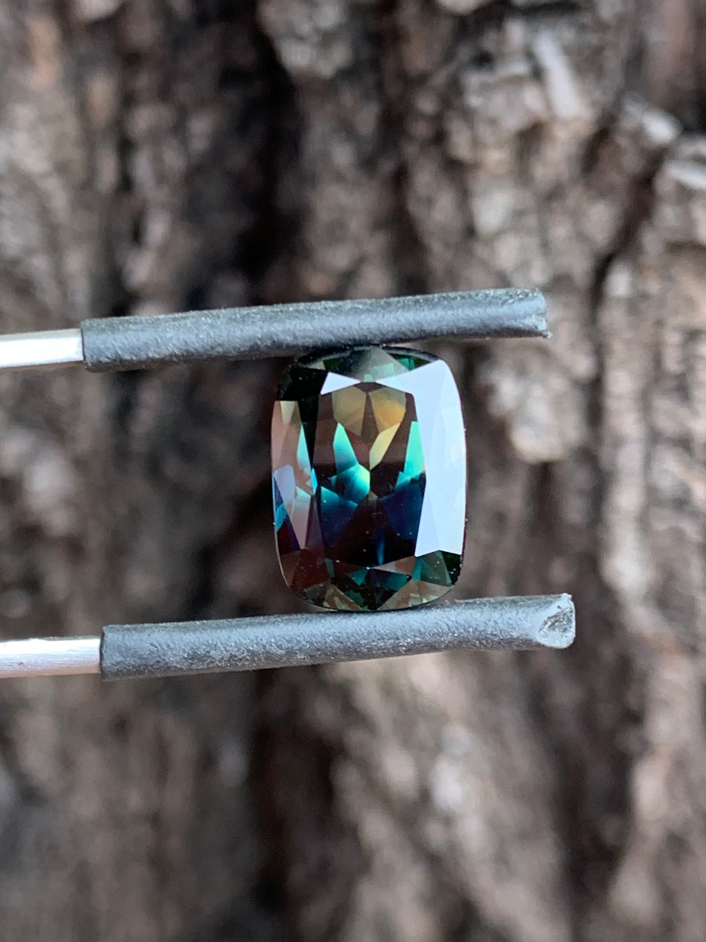 Australian sapphire cushion cut large natural parti stone with colour zoning