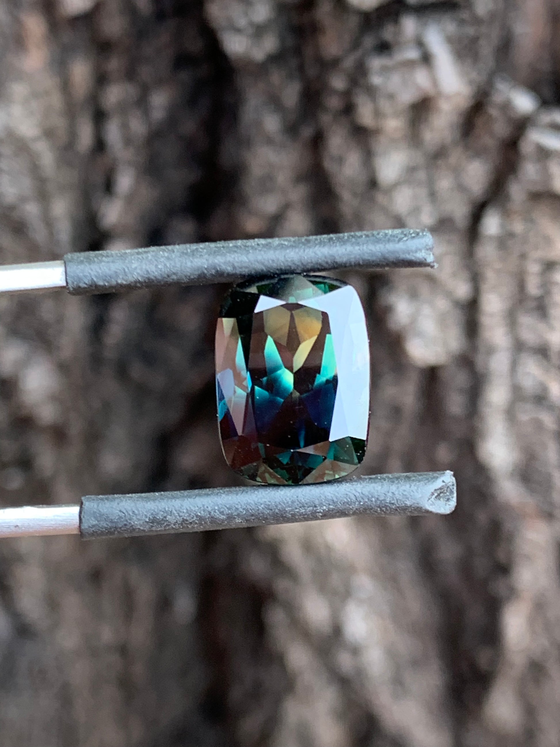 Australian sapphire cushion cut large natural parti stone with colour zoning