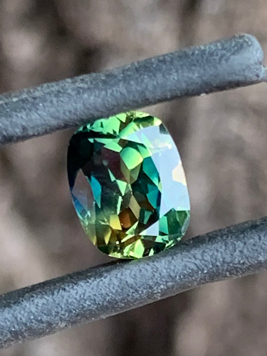 1.46ct unheated Australian teal parti sapphire with yellow zoning cushion cut