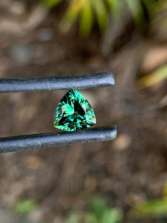 1.58ct green Australian sapphire in a trillion cut