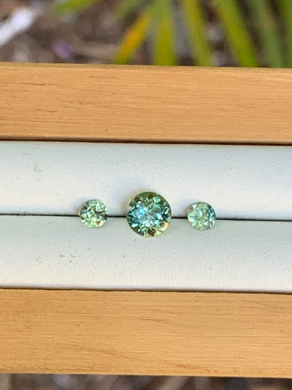 Close-up of three natural unheated Australian sapphires for a trilogy ring