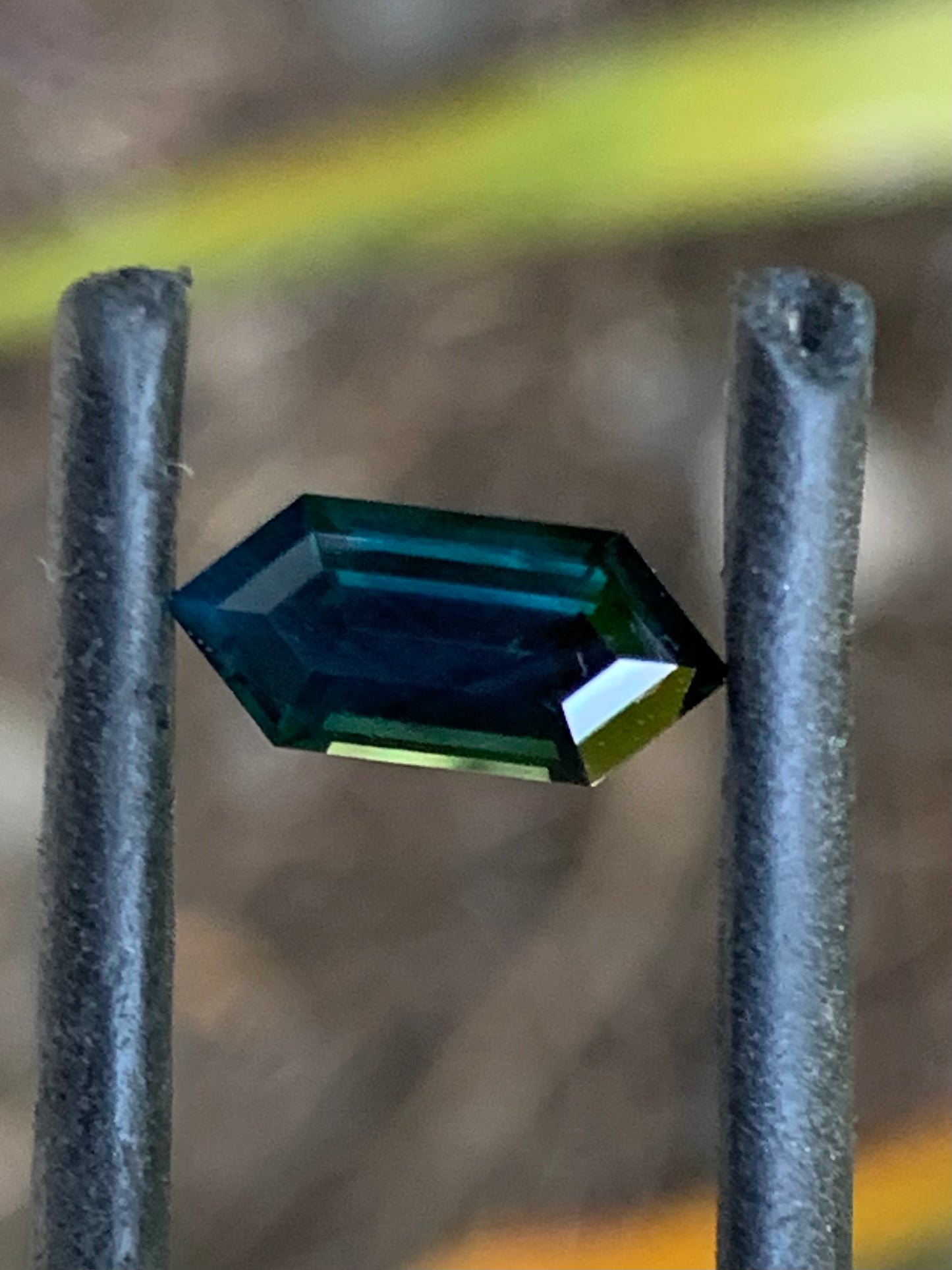 Natural Australian sapphire with dark blue colour and geometric hexagon shape