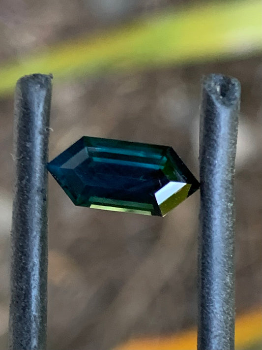 Natural Australian sapphire with dark blue colour and geometric hexagon shape