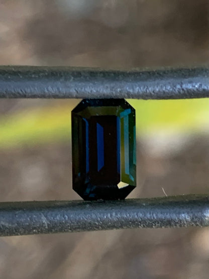 Natural Australian sapphire with dark blue colour and classic emerald cut