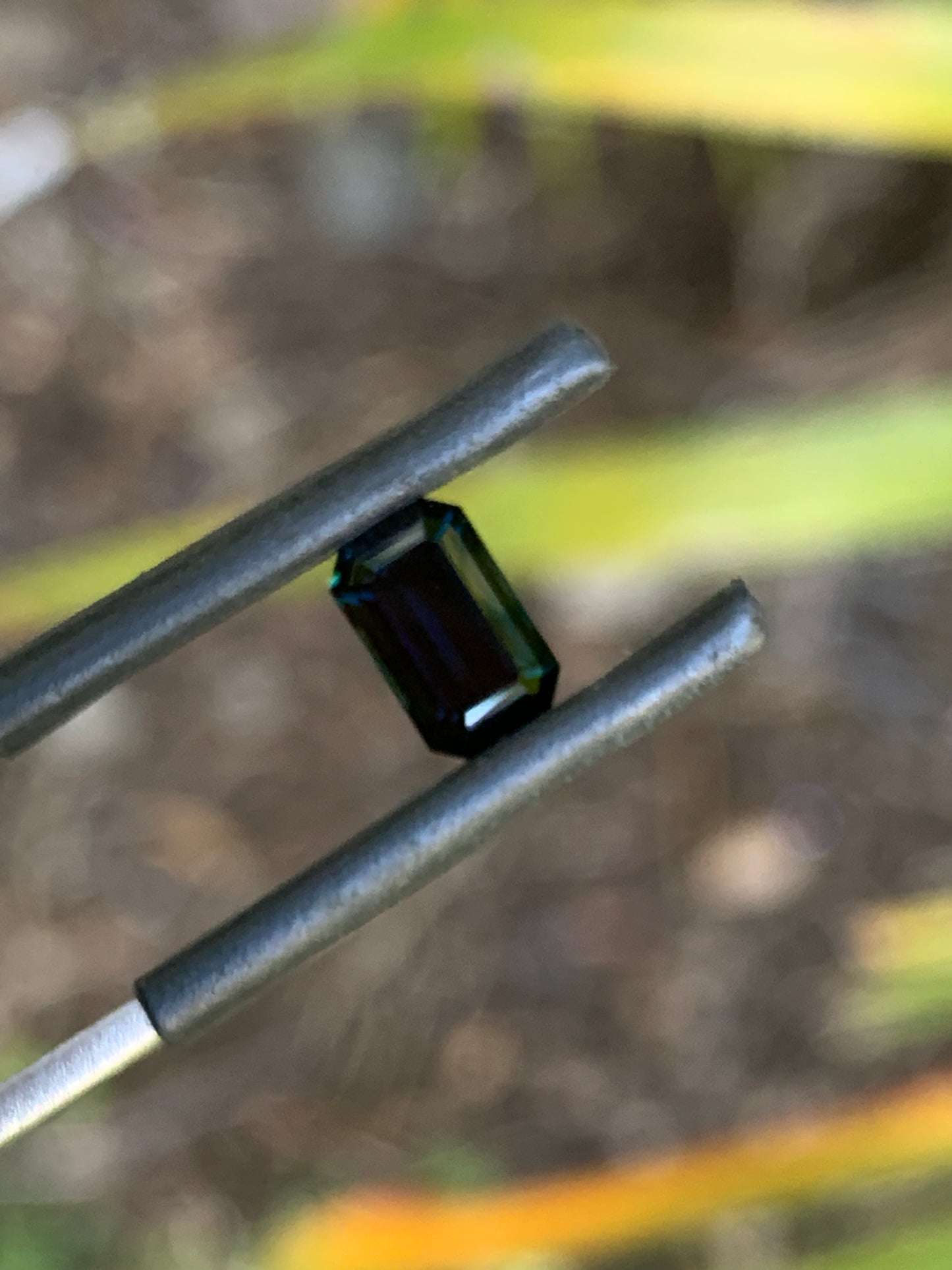 Close-up of a 1.51ct emerald cut sapphire from Australia