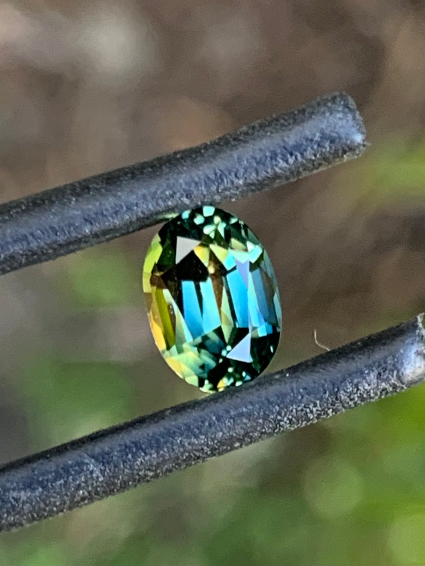 Natural Australian sapphire with blue green and yellow parti colour