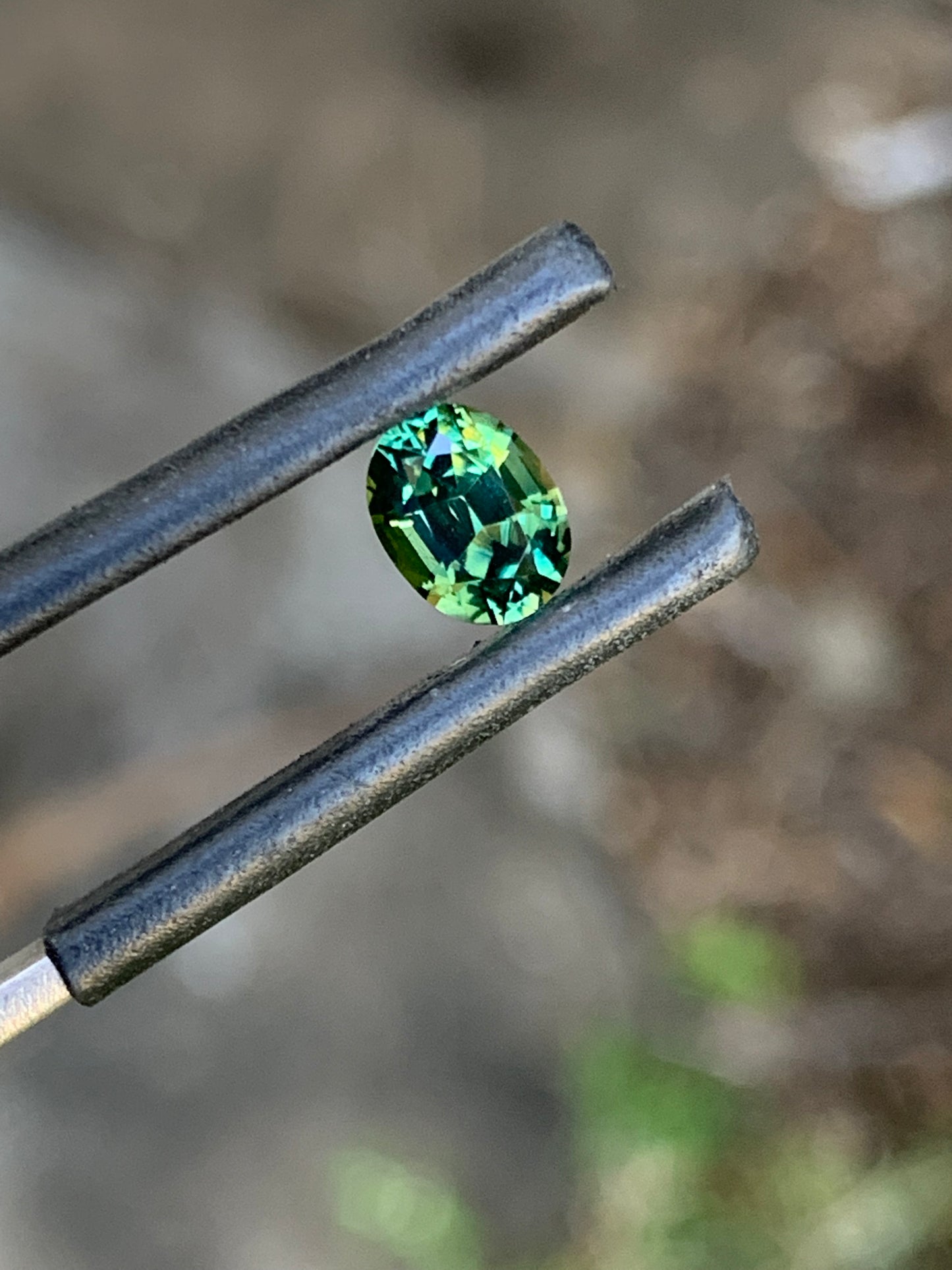 Unheated oval green sapphire suitable for bespoke jewellery