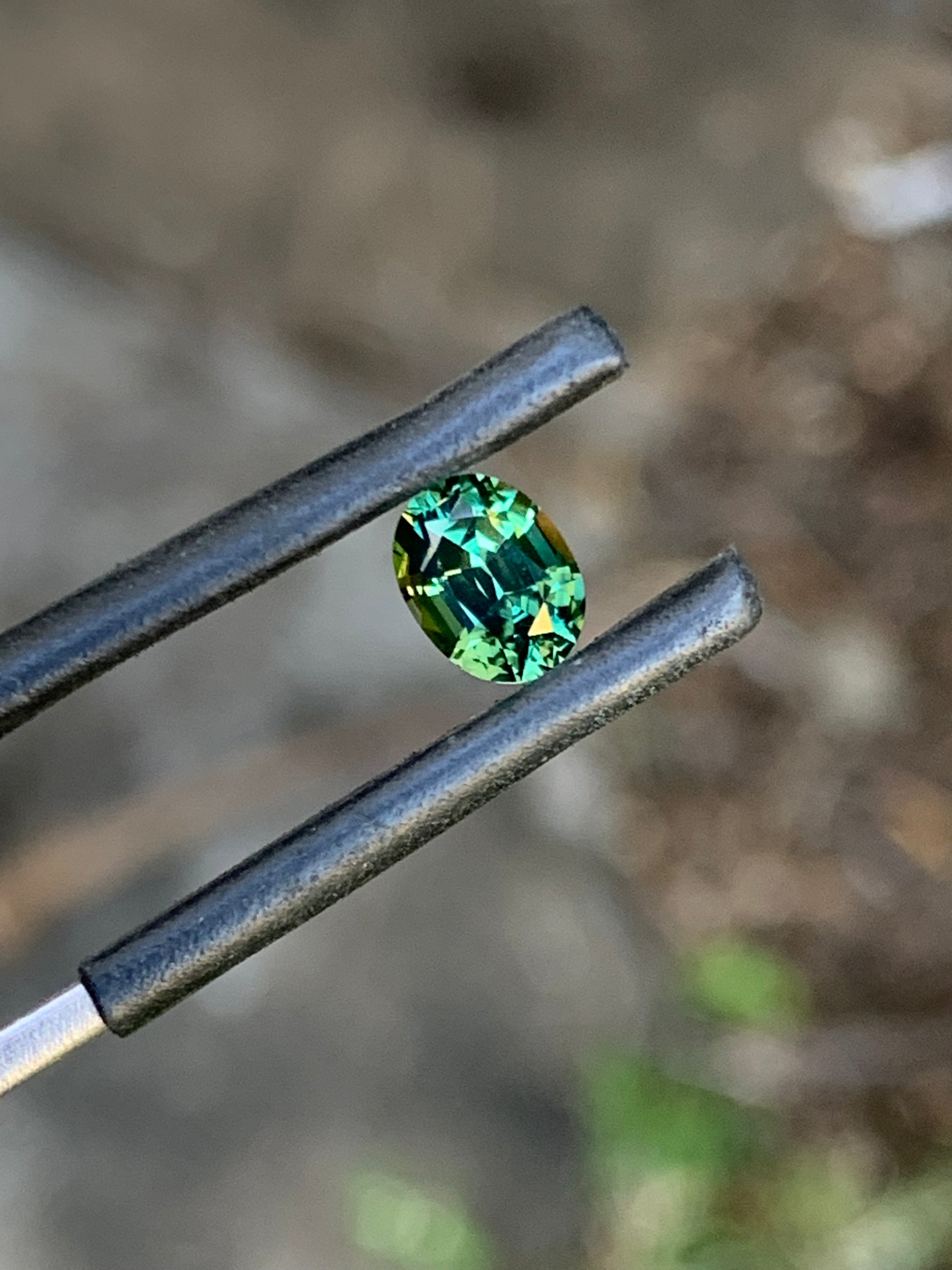 Close-up of a 0.93ct green Australian sapphire