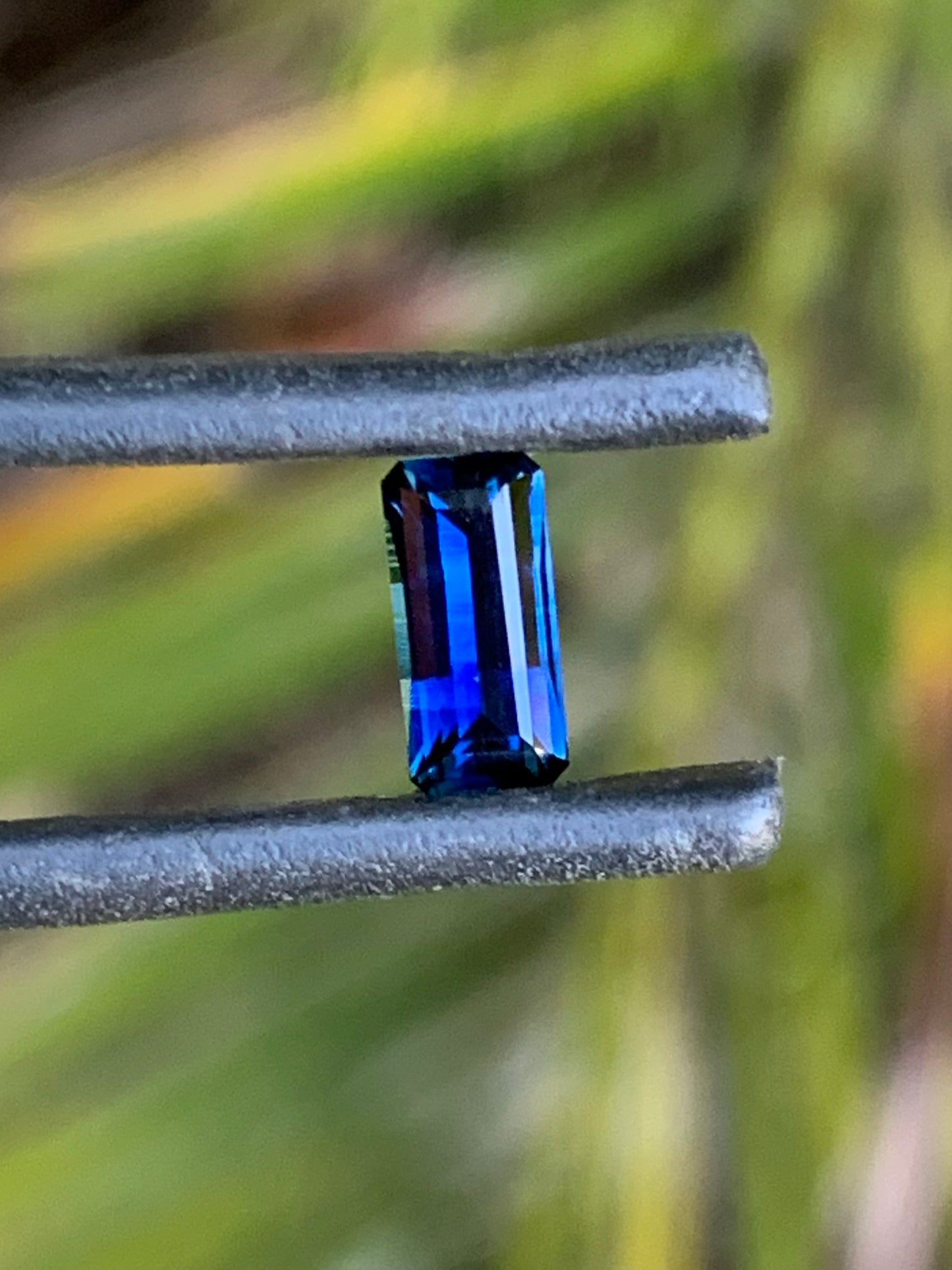 Natural Australian sapphire with rich blue colour and light banding