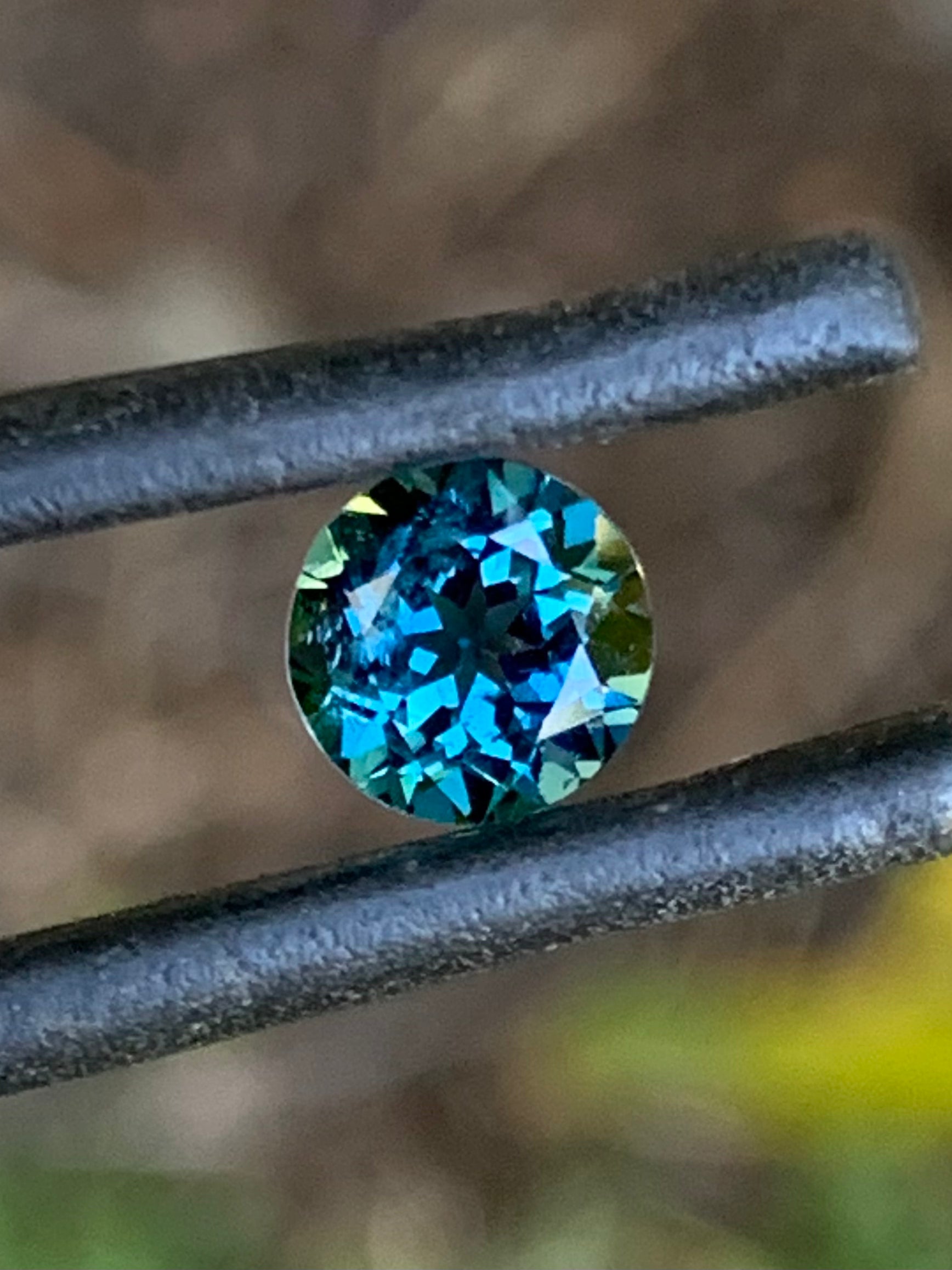 Vibrant blue round Australian sapphire with beautiful sparkle
