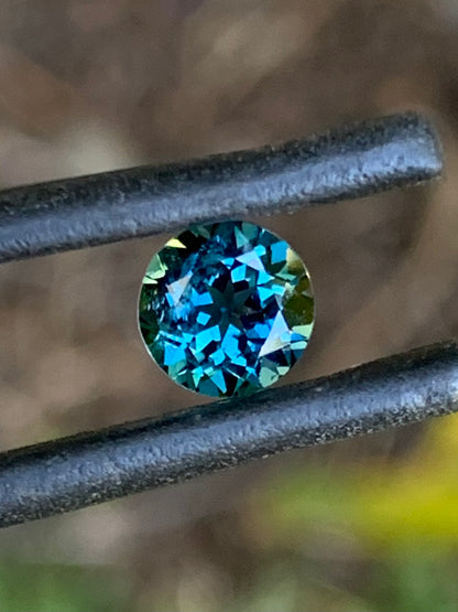 Vibrant blue round Australian sapphire with beautiful sparkle