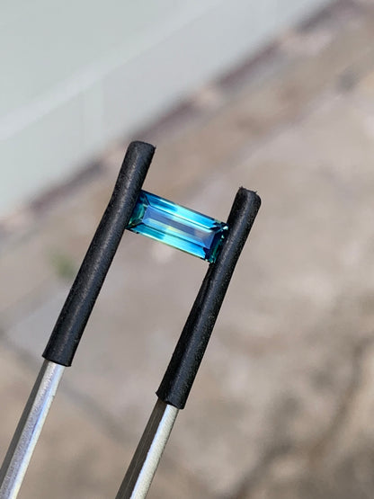 Natural Australian sapphire with light blue ends and yellow centre