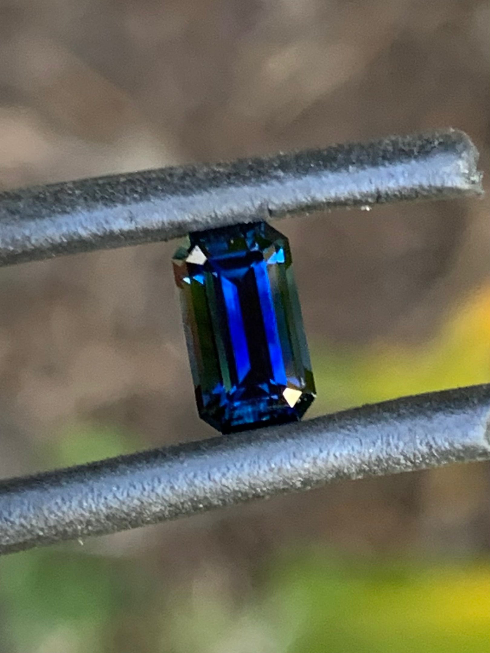 Close-up of a 0.91ct dark blue Australian sapphire