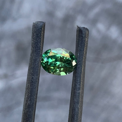 Oval cut green sapphire with a fresh and lively appearance