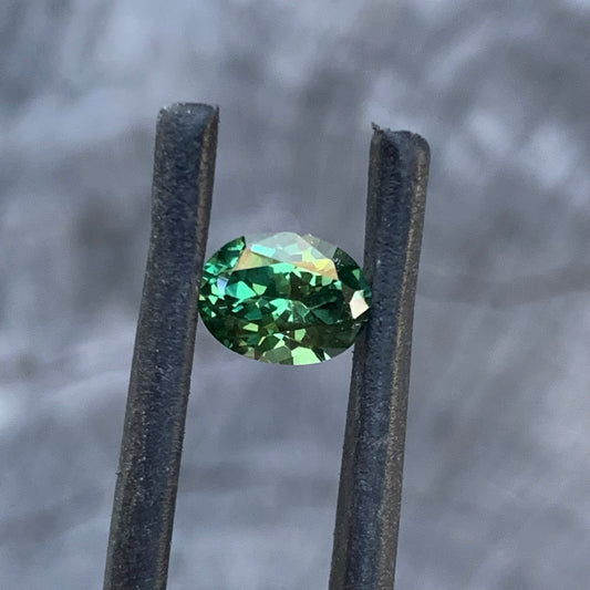 Oval cut green sapphire with a fresh and lively appearance