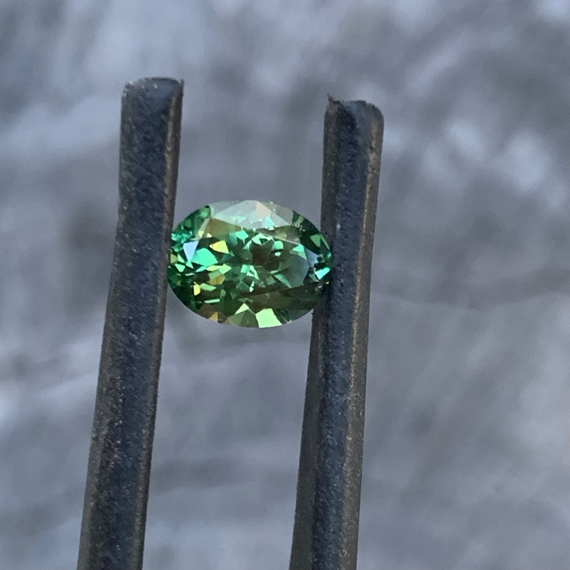 Natural Australian green sapphire, 1.24ct oval cut