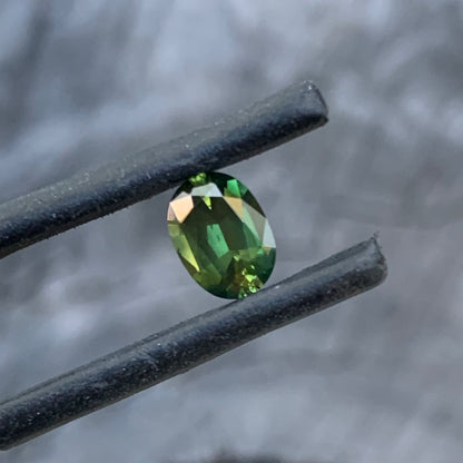 0.90ct chartreuse green Australian sapphire, oval cut