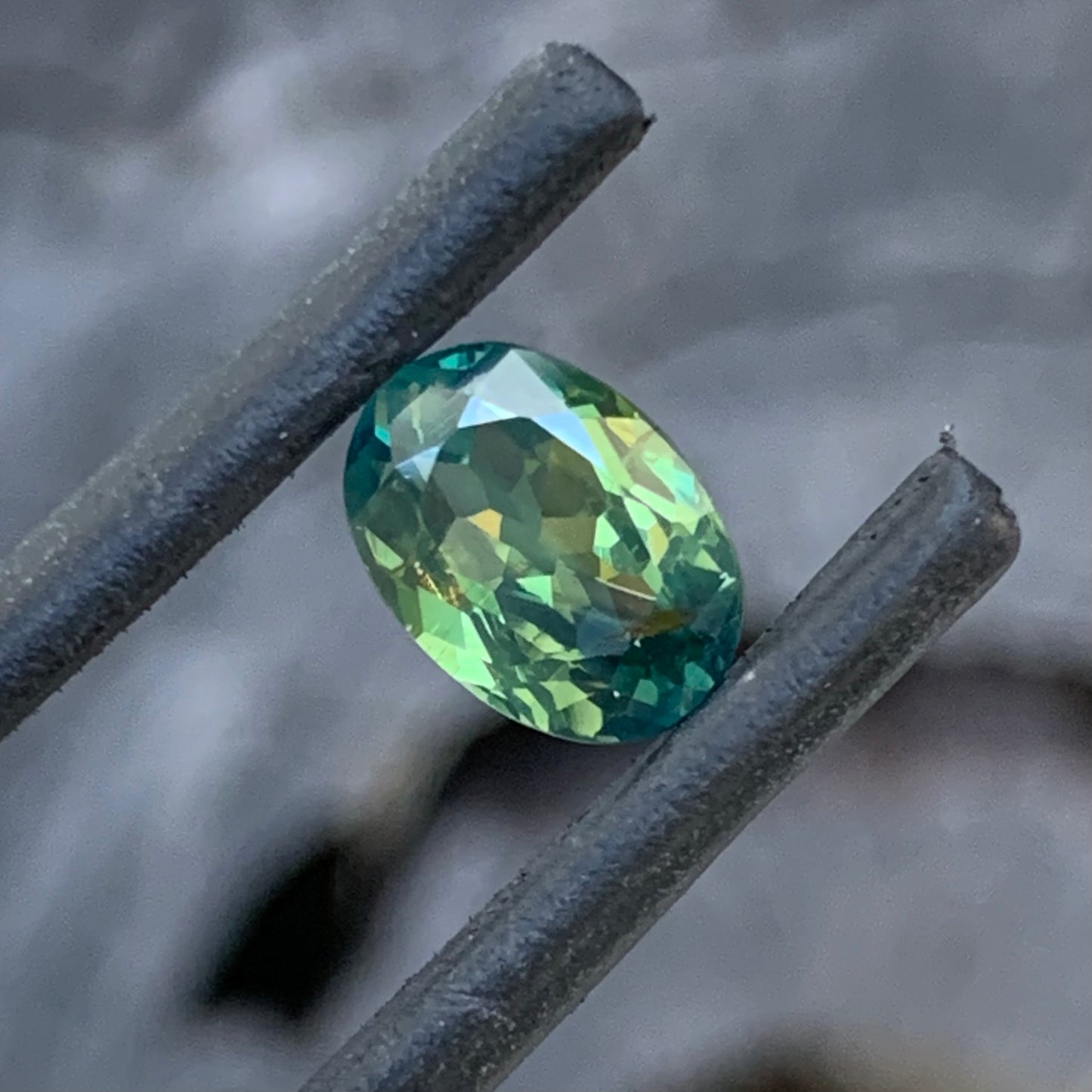 1.55ct teal green parti Australian sapphire, oval cut