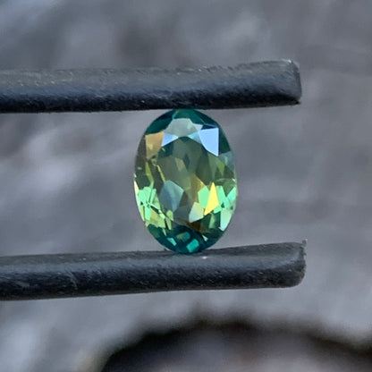 Oval Australian sapphire with teal and green colour play