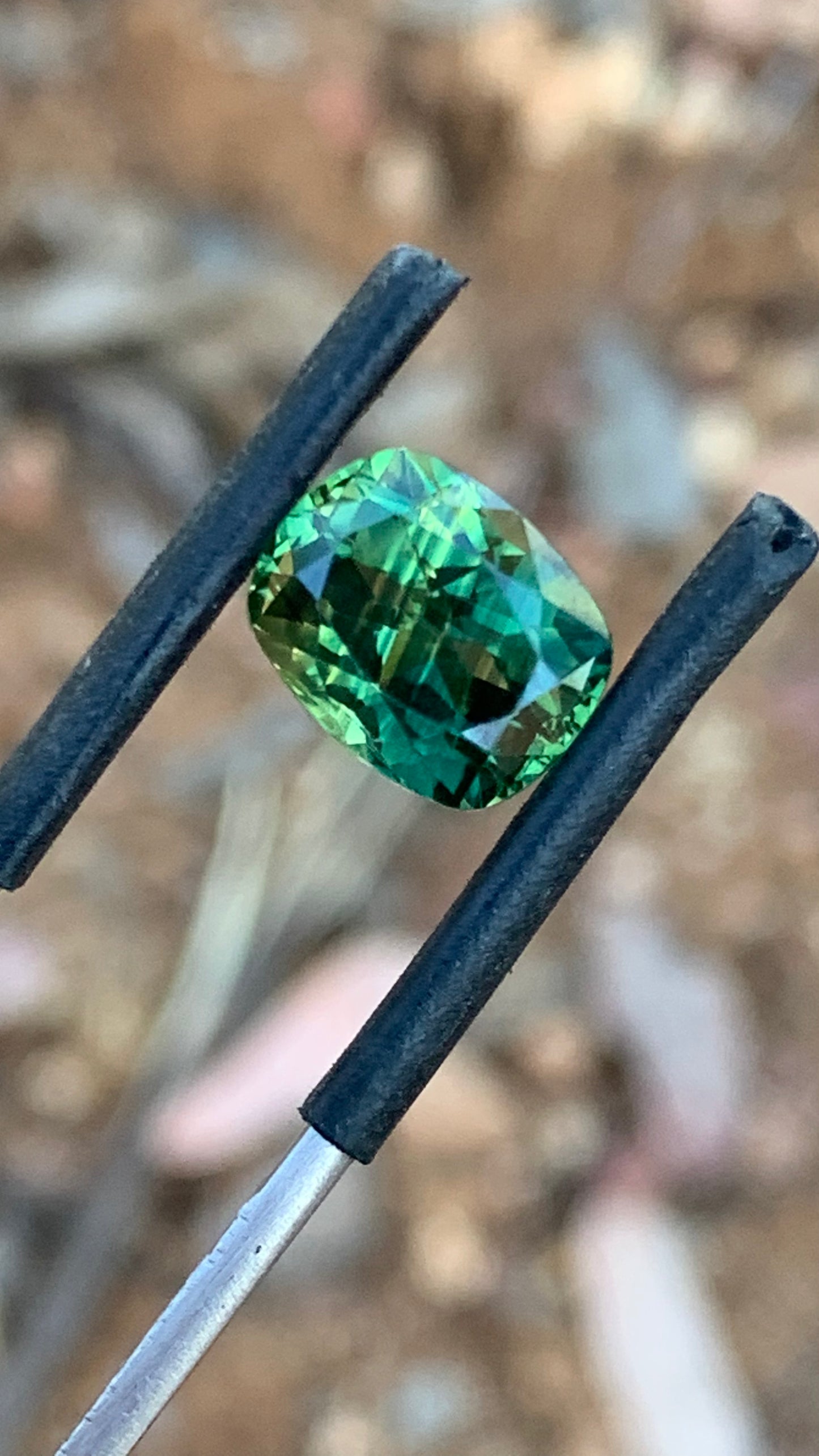 Eye clean Australian sapphire with lively striped green and yellow colour zoning