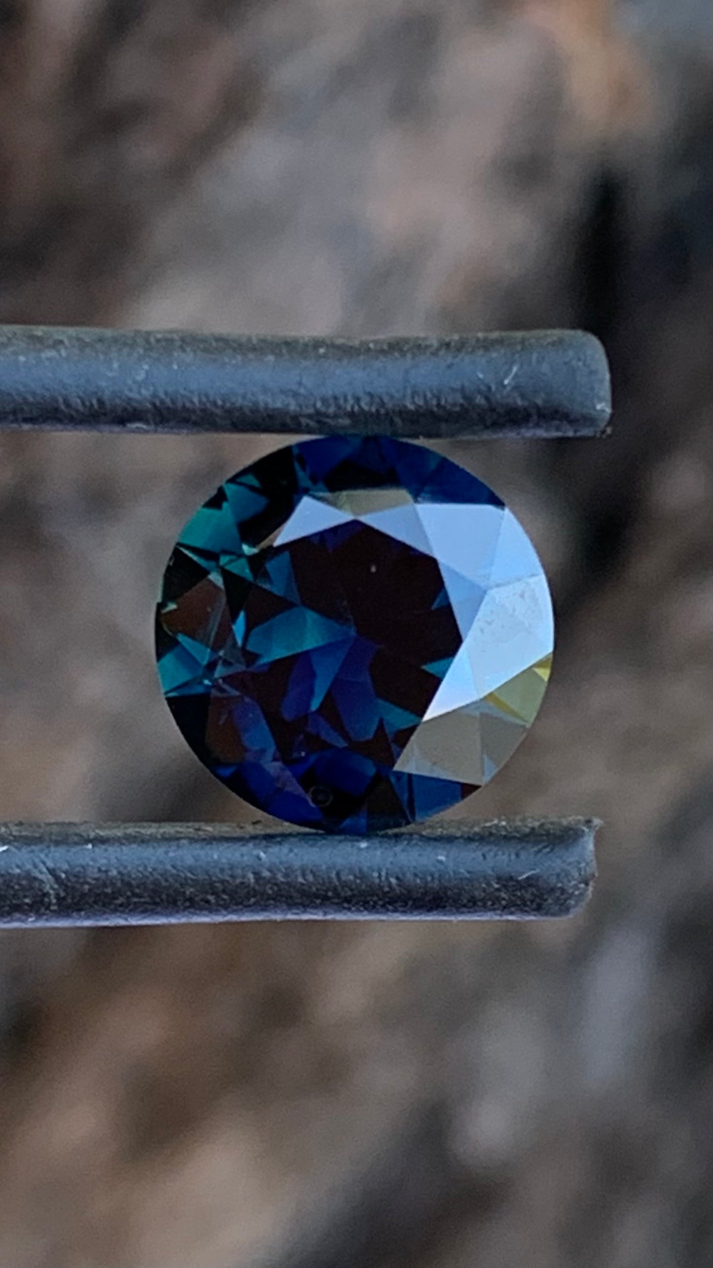 Top view of Blue and Yellow Australian Parti Sapphire