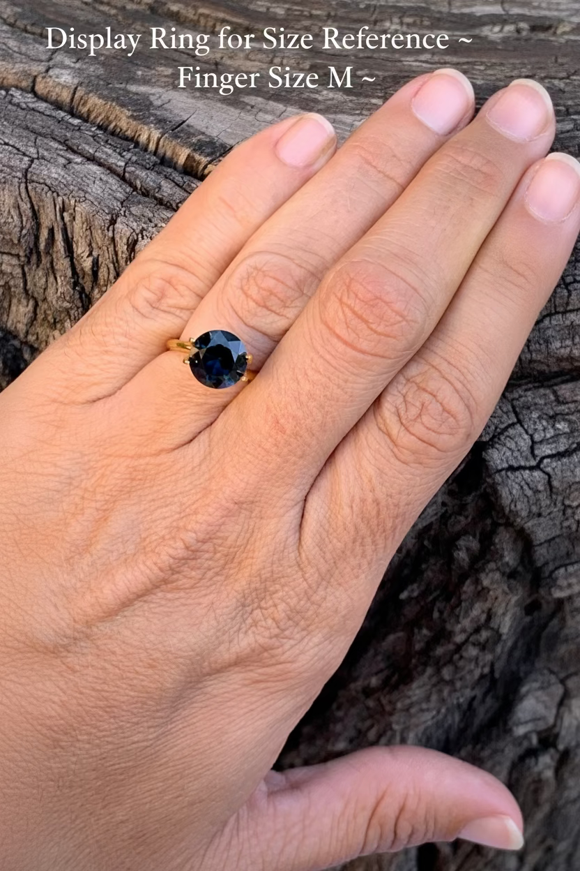 large Australian Parti Sapphire on hand for size reference
