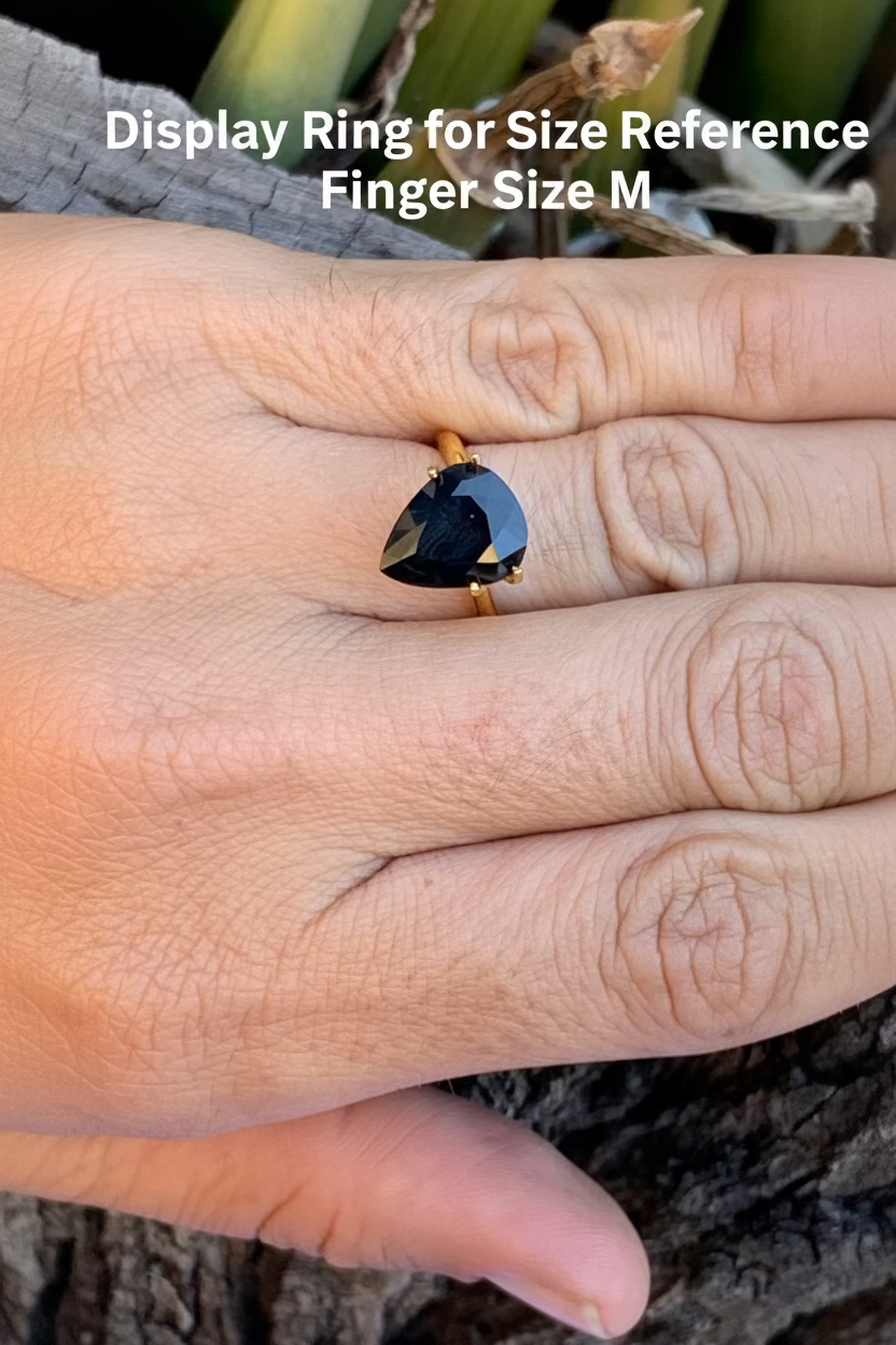 Large Pear Shaped Australian Sapphire on hand for size reference