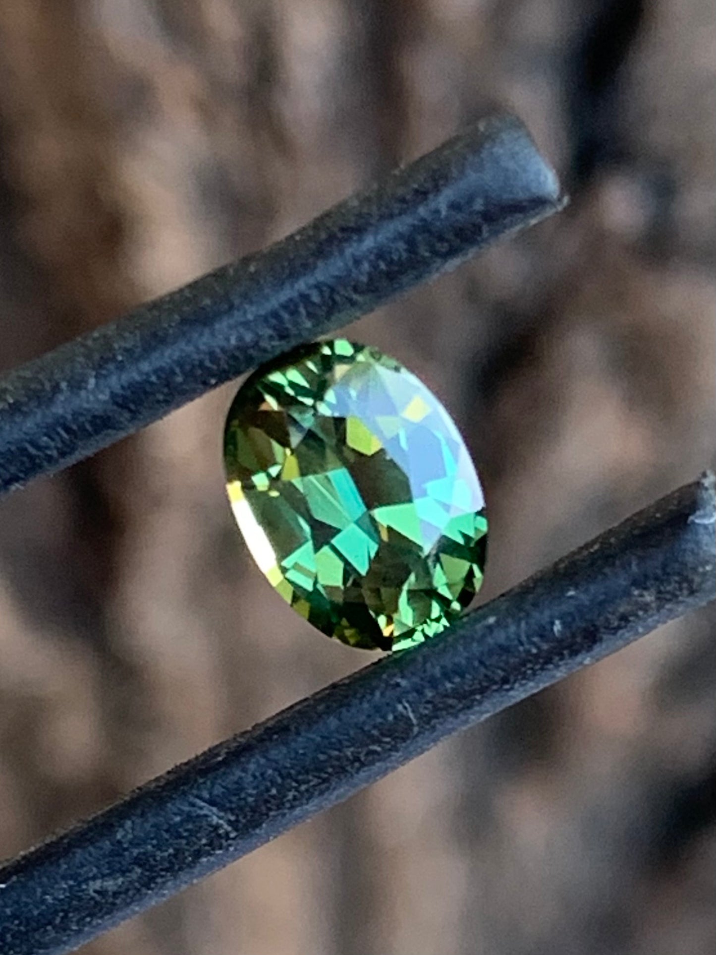 1.12ct bright green Australian sapphire oval cut from the Central Queensland Gemfields