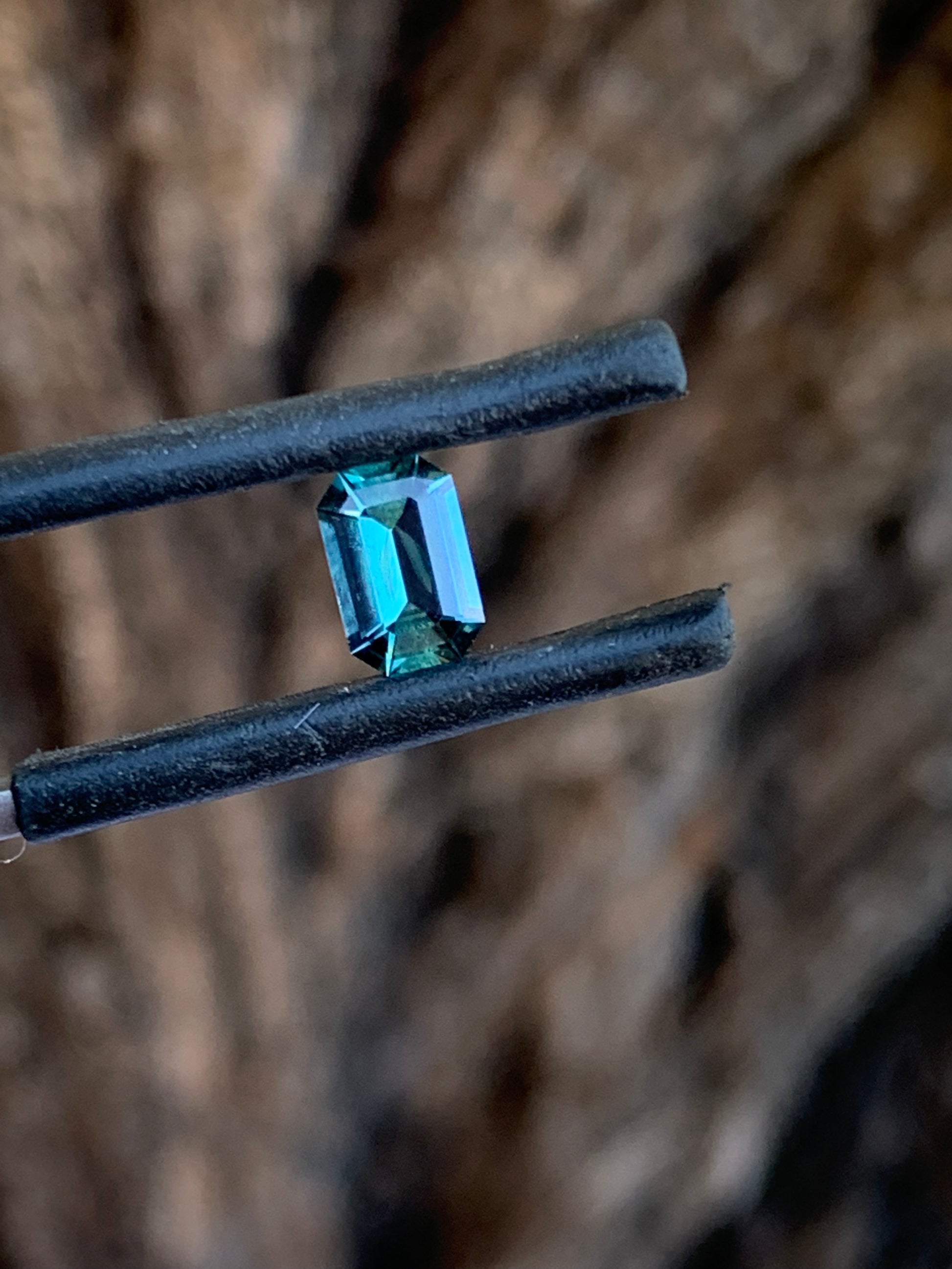 Eye clean 0.72ct Australian sapphire in a modern emerald cut