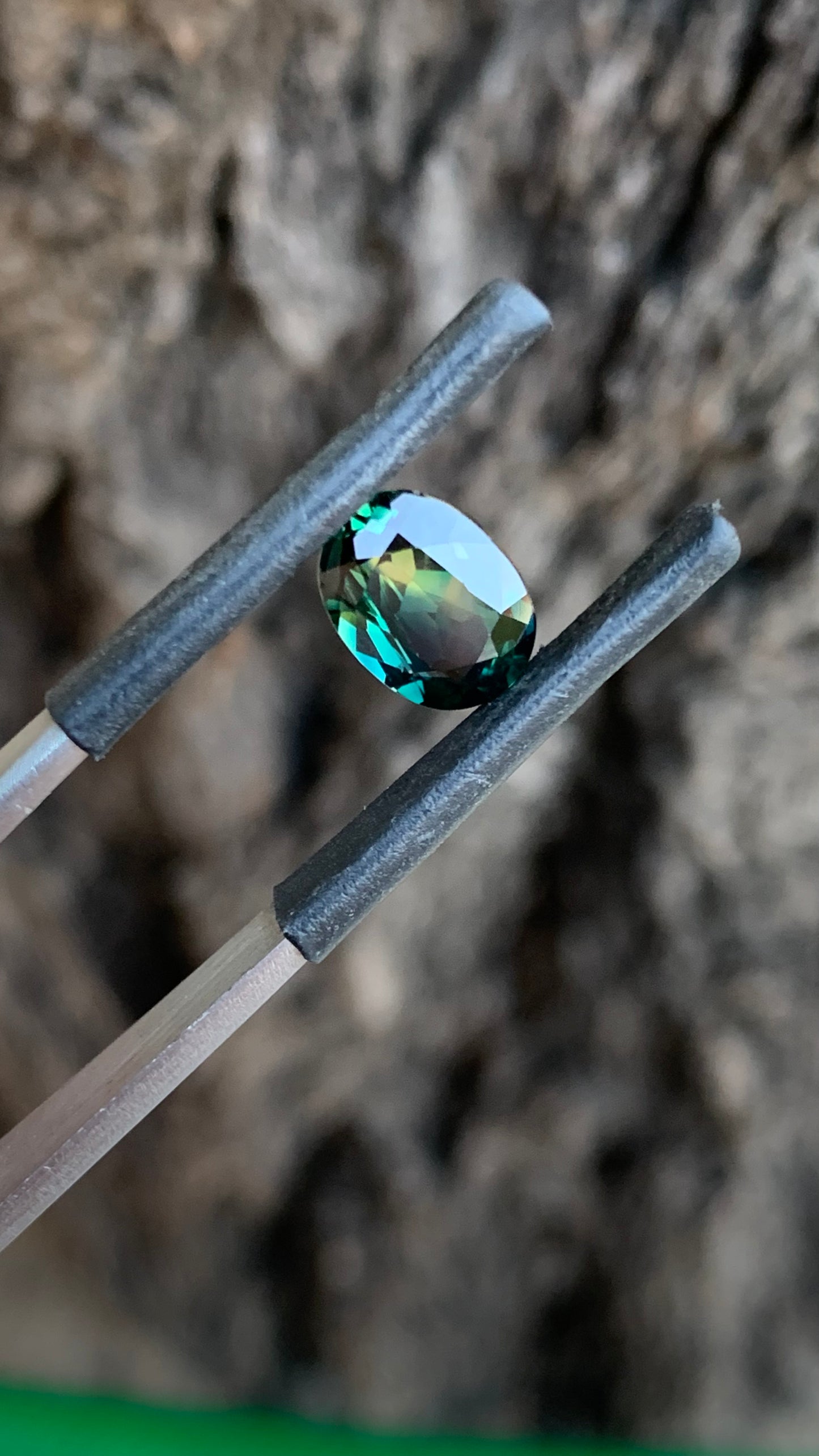 2.23ct teal parti Australian sapphire oval cut with blue yellow and green
