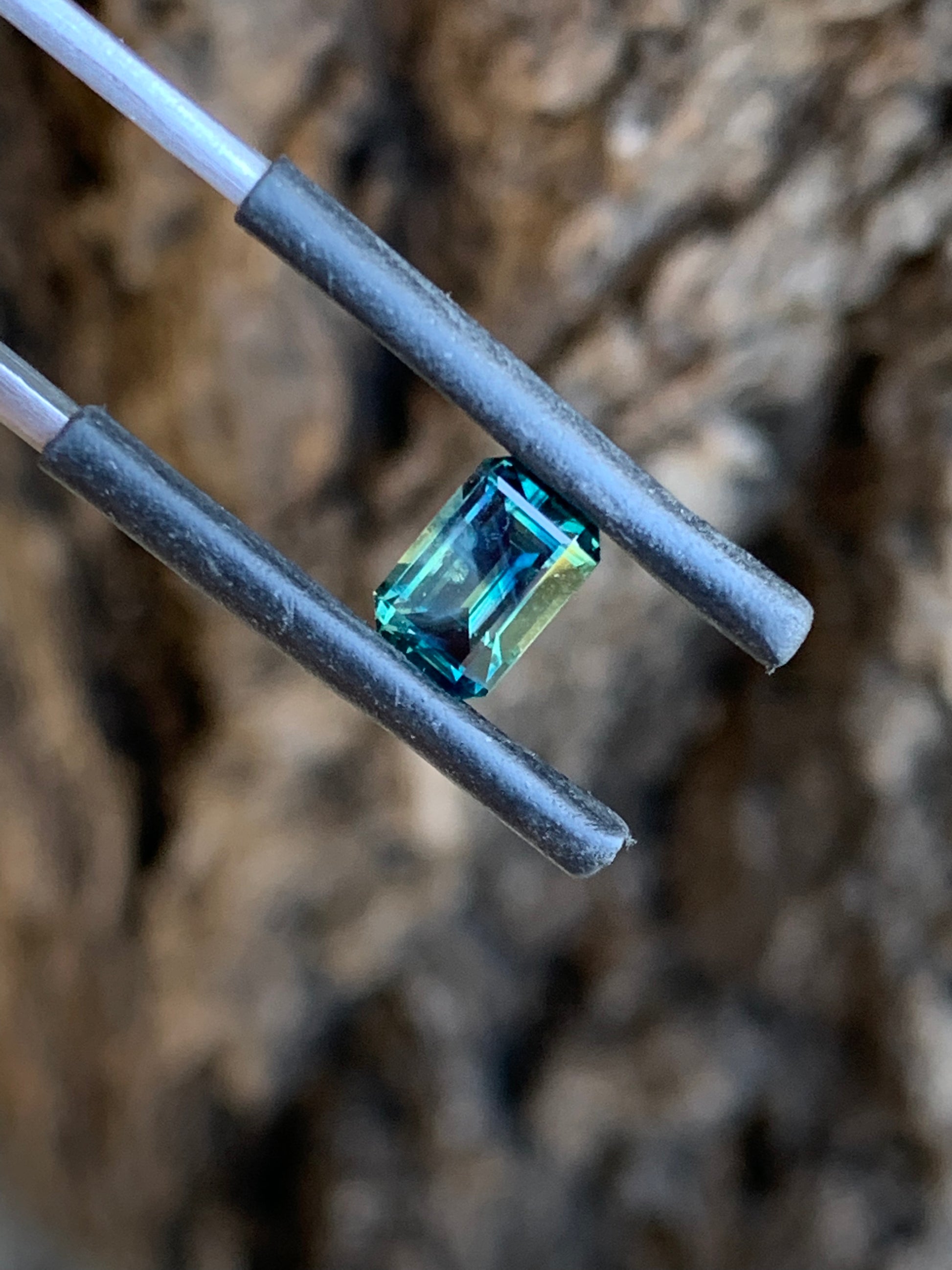 Natural Australian teal sapphire with striking blue green parti colour zones