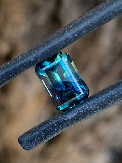 1.42ct teal parti Australian sapphire emerald cut with split colour zoning