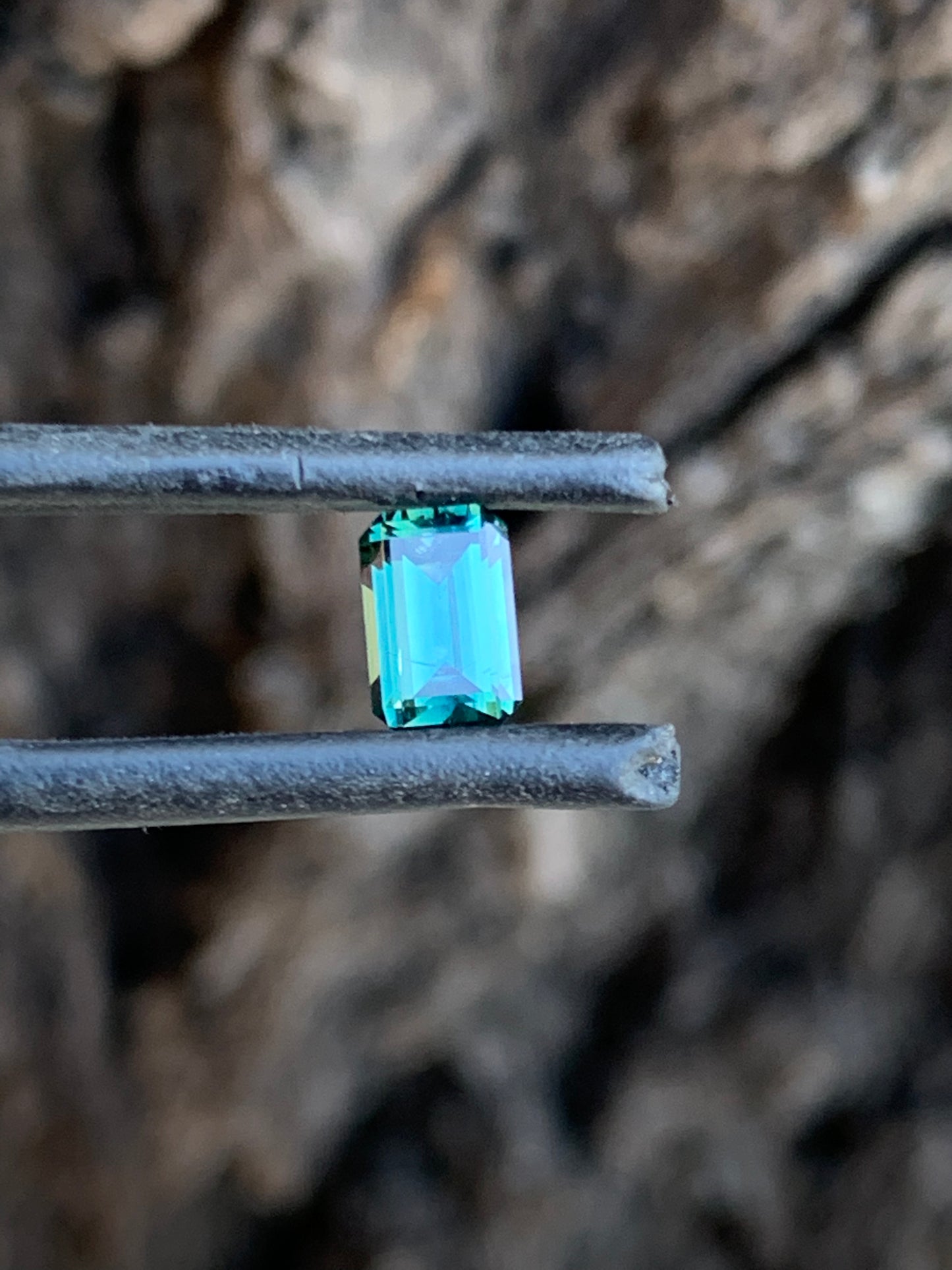 Natural Australian teal sapphire with rich colour and crisp emerald cut