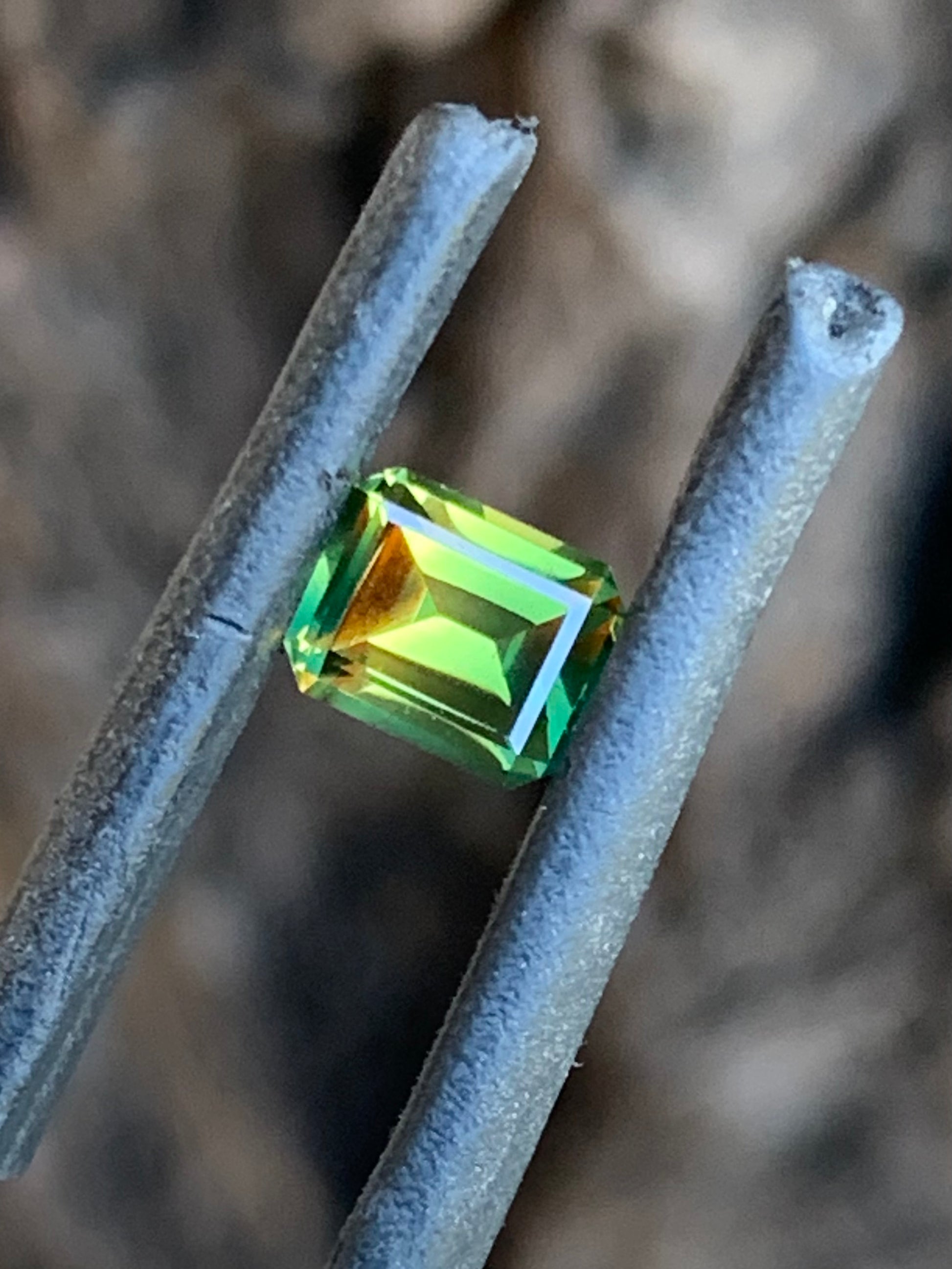0.93ct bright yellow and green parti Australian sapphire emerald cut