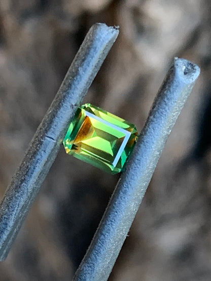 0.93ct bright yellow and green parti Australian sapphire emerald cut