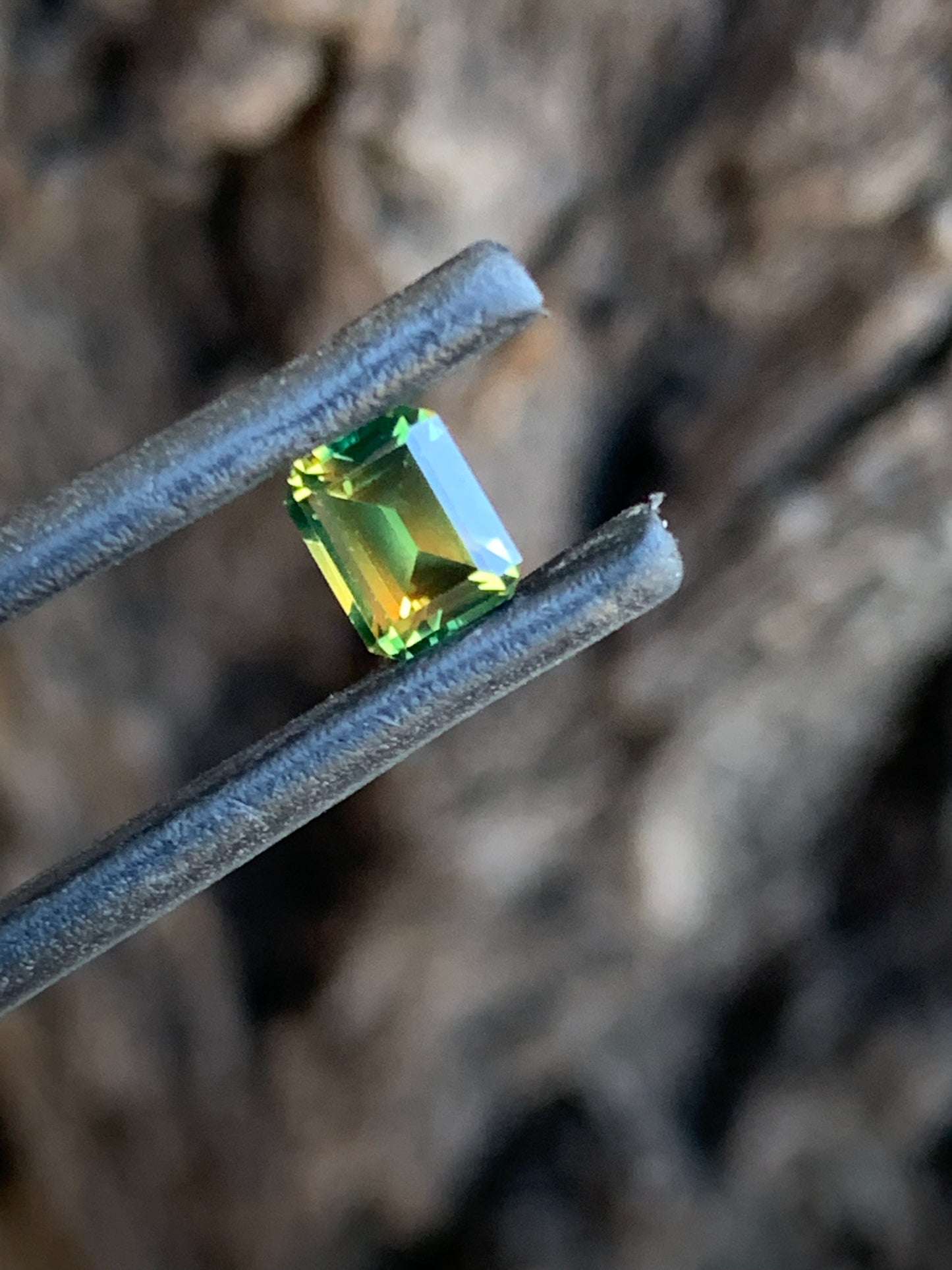 0.93ct eye clean Australian sapphire with vibrant yellow and green contrast