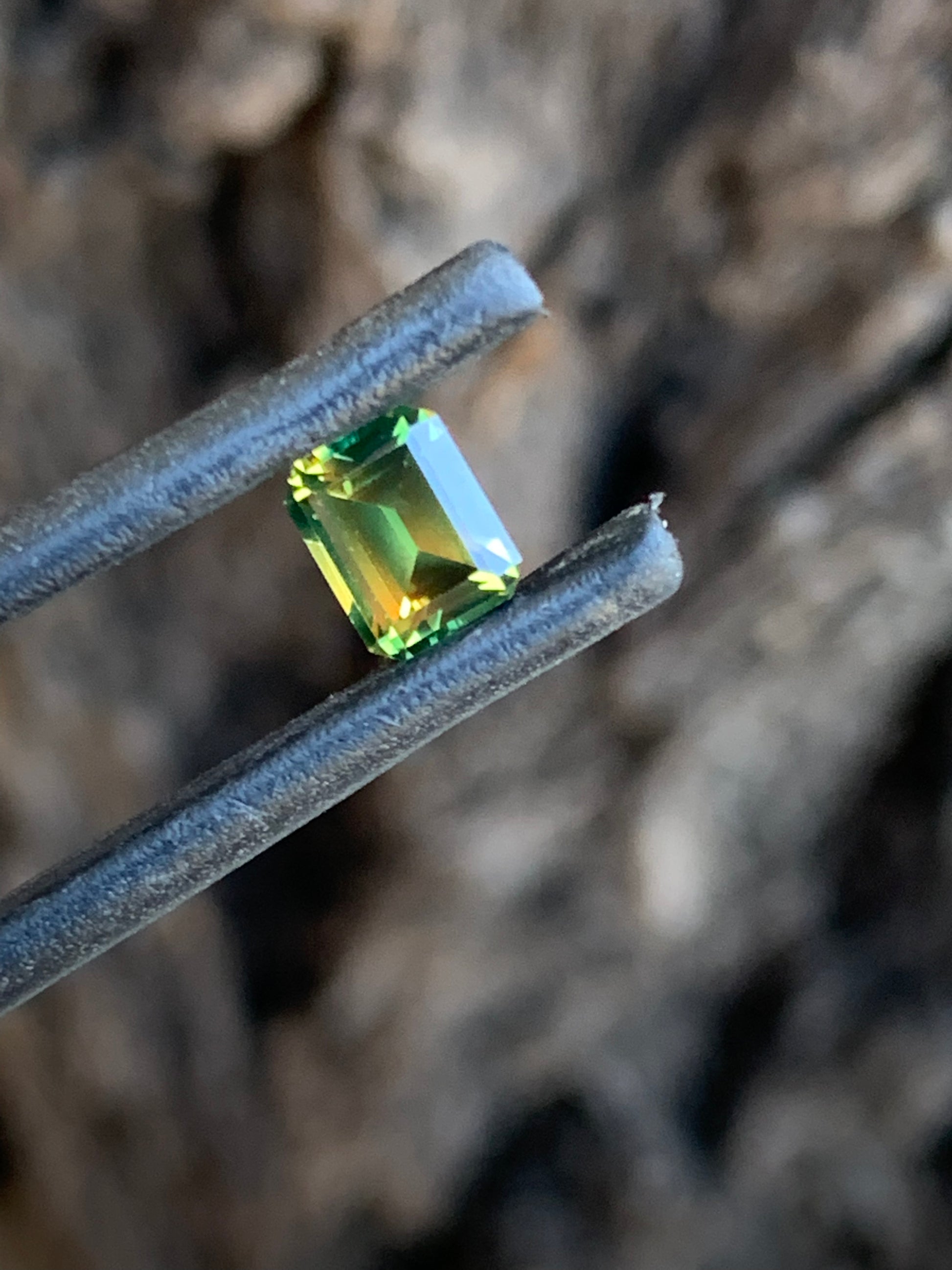 0.93ct eye clean Australian sapphire with vibrant yellow and green contrast